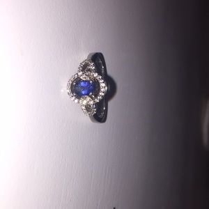 Sterling silver ring with blue gem